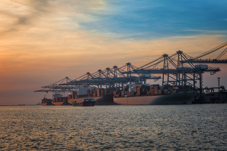 International port worldwide services to the largest ocean tonnage vessels, the way to logistics system in import and export shipment of containers and general bulk cargo includingの写真素材