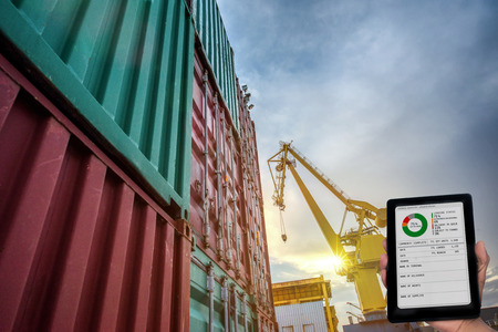 containers unit are storage in port yard in status report for cargo delivery to the ship in port...