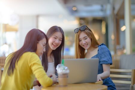 Working group of women in meeting outdoor, pre planing meeting in scope of working by senior training to junior working in same directionの写真素材