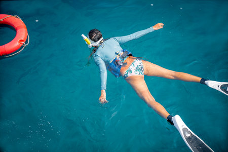 Tourist in seawater enjoy for diving explore the nature of underwater sealife livingの写真素材