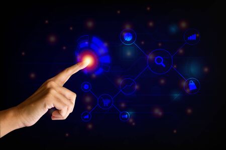 Hand touch on button virtual screen for using shop online, search data and financial icon on dark blue background. Technology and network concept.の写真素材