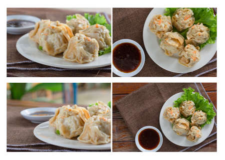 Set of Chinese Steamed Dumpling, Shumai on white dish served with soy sauce on wooden table. Delicious Dim sum pork.の写真素材