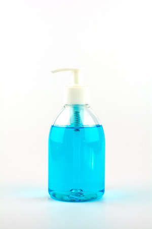 Hygiene and health care concept. A bottle of alcohol for cleaning isolated on white background.の写真素材
