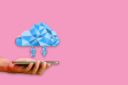 Cloud data storage concept. Hand-holding smartphone or mobile with Polygon cloud computing transfer...