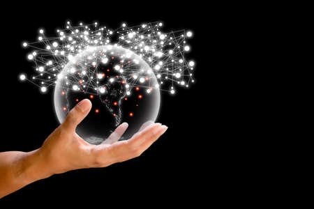 Global network connection and business and technology concept. Hand holding transparency of the...