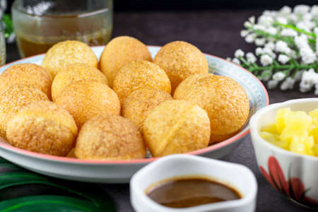 Indian traditional snack. Pani puri with boiled potato and sauce.の写真素材