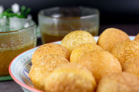 Indian traditional snack. Pani puri with boiled potato and sauce.の写真素材