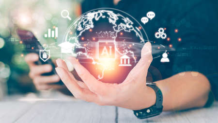 Metaverse and (IoT) Internet of things concept. Businessman holds virtual global in hand. communication technology, online learning, digital marketing, big data, financial and banking.の写真素材