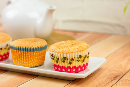 Homemade Japanese sponge cake, and castella cake on a wooden table. Delicious dessert.の写真素材