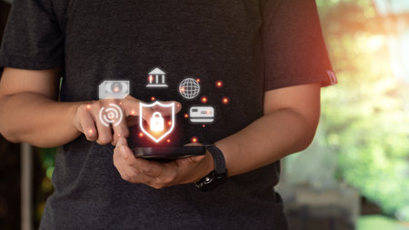 Internet and cybersecurity concept. A businessman is protecting personal data on mobile or...