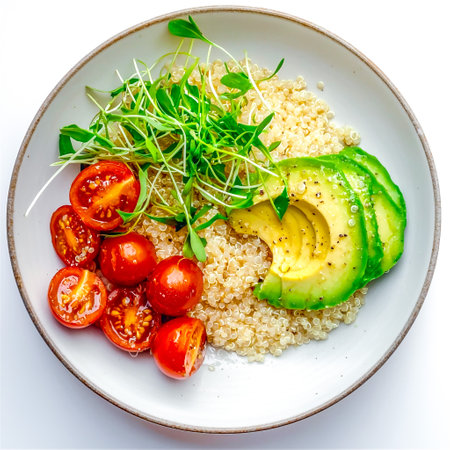 Healthy food and fruit concept. Flat-lay avocado, Quinoa, rocket, and tomato salad in white dish isolated on white background. Generative AI.の素材