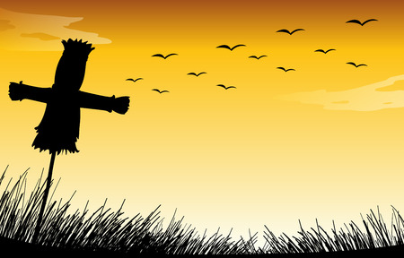 Silhouette scarecrow on the field with sunsetのイラスト素材
