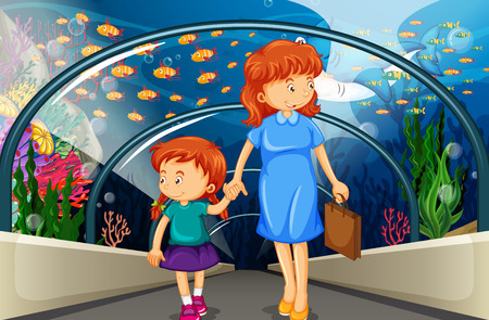 Mother and kid at the aquarium illustrationのイラスト素材