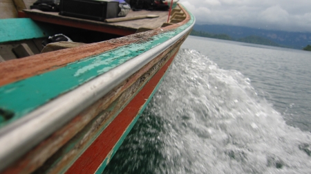Moving boat in the lakeの写真素材