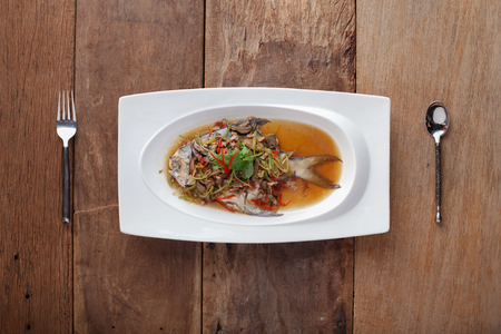 White Pomfret Steamed Dish,Ready to eat. On The Tableの写真素材