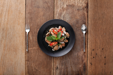 Spicy fried Clams with herb,Ready to eat. On The Tableの写真素材