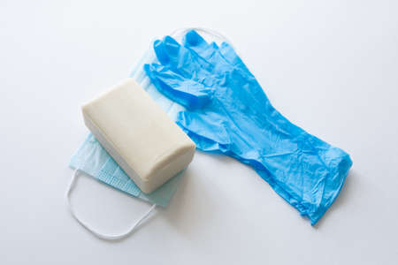 Pair of latex medical gloves, medical masks, sanitizer gel for hand hygiene, remedies, soap,...