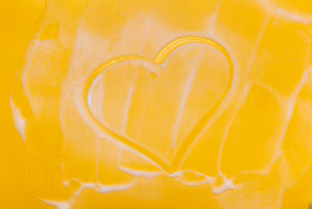 heart painted in foam on a pity background.の写真素材