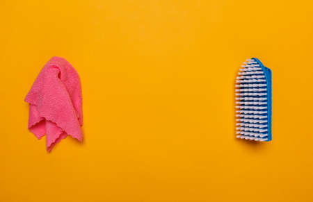 cleaning rag and blue brush. place for text.の写真素材