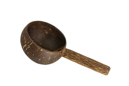 Dipper made from coconut shell, traditional container for drinking water of Thai people, isolated on white backgroundの写真素材