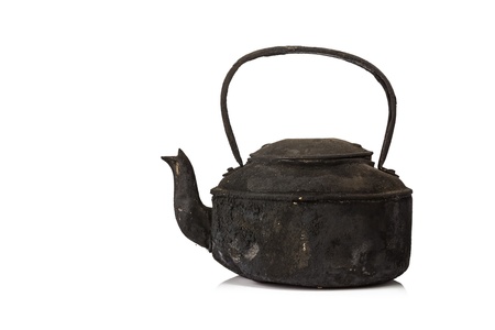 Old sooty kettle isolated on white backgroundの写真素材