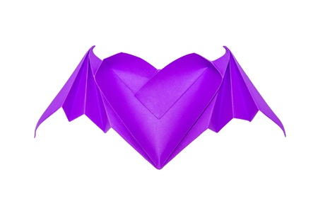 Origami heart with bat wings isolated on white backgroundの写真素材