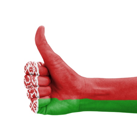 Hand with thumb up, Belarus flag painted as symbol of excellence, achievement, good - isolated on white backgroundの写真素材