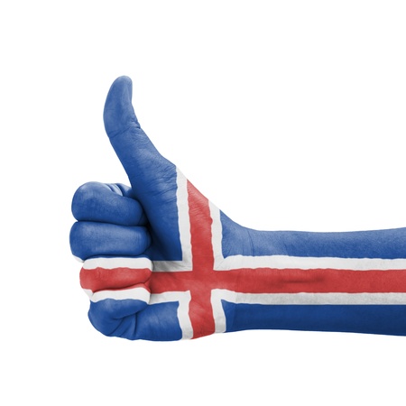 Hand with thumb up, Iceland flag painted as symbol of excellence, achievement, good - isolated on white backgroundの写真素材