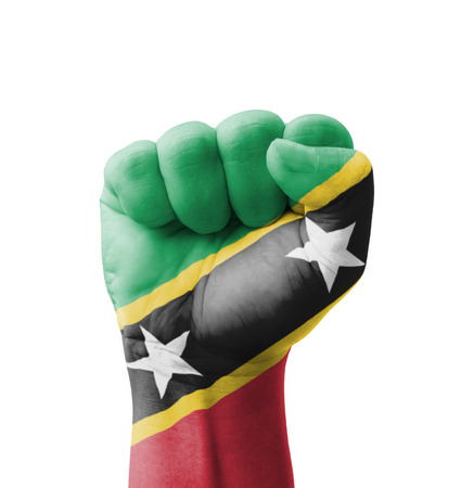 Fist of Saint Kitts and Nevis flag painted, multi purpose concept - isolated on white backgroundの写真素材