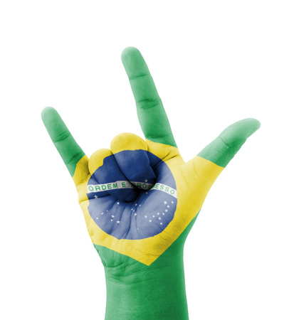 Hand making I love you sign, Brazil flag painted, multi purpose concept - isolated on white backgroundの写真素材