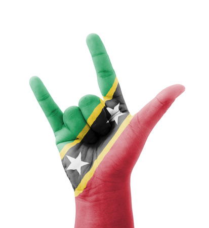 Hand making I love you sign, Saint Kitts and Nevis flag painted, multi purpose concept - isolated on white backgroundの写真素材
