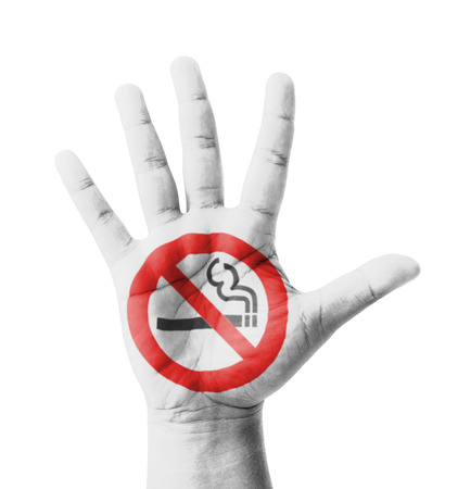 Open hand raised, No Smoking sign painted, multi purpose concept - isolated on white backgroundの写真素材