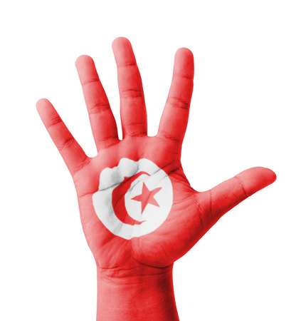 Open hand raised, multi purpose concept, Tunisia flag painted - isolated on white backgroundの写真素材
