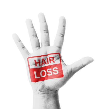 Open hand raised, Hair Loss sign painted, multi purpose concept - isolated on white backgroundの写真素材