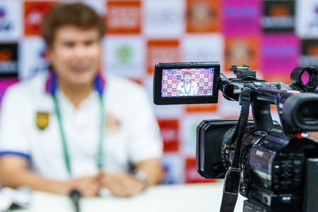 SISAKET THAILAND-FEBRUARY 18: Professional camcorder recording at a press conference after the match between Sisaket FC and BEC Tero at Sri Nakhon Lamduan Stadium on February 18,2015,Thailandのeditorial素材