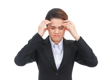 Asian business woman with headache isolated on white backgroundの写真素材