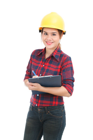 Asian engineer woman with clipboard isolated on white backgroundの写真素材