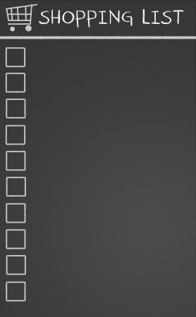 Shopping list with cart on a chalkboardの写真素材