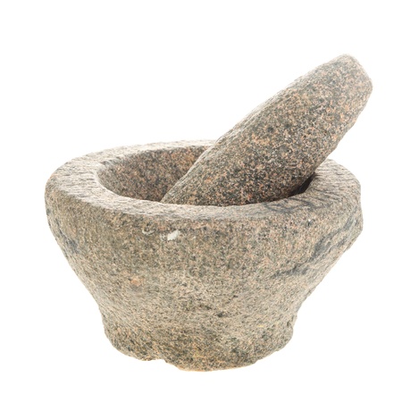Stone mortar and pestle on a white backgroundの写真素材