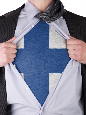 Business man rips open his shirt to show his Finnish flag t-shirtの写真素材