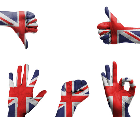 A set of hands with different gestures wrapped in the flag of the UKの写真素材