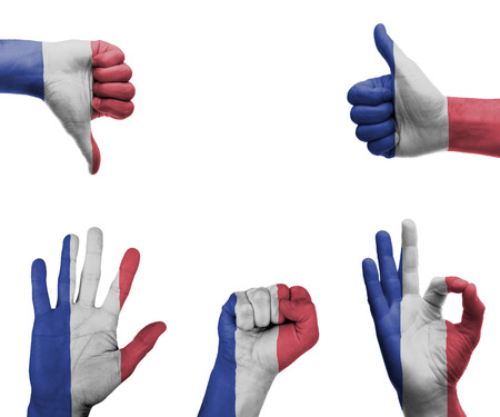 A set of hands with different gestures wrapped in the flag of Franceの写真素材