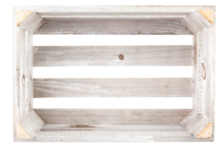 An empty vintage wooden crate on white backgroundの写真素材