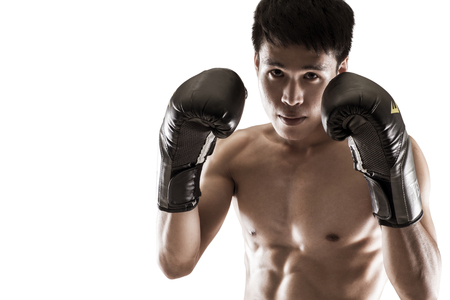 A man in a boxing stand on white background.の写真素材