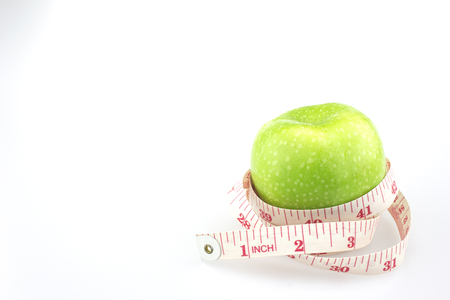 Green apples measured the meter, sports applesの写真素材