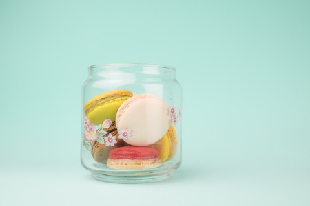 Sweet and colourful french macaroons on retro-vintage background?の写真素材