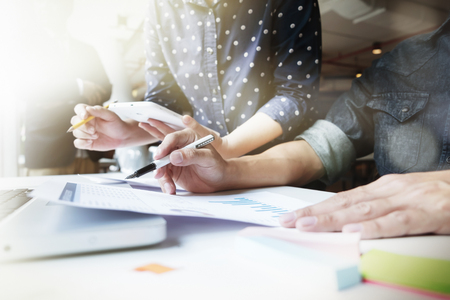 Business people meeting  teamwork idea concept. Cooperation corporate achievement planning teamwork concept.Business people meeting to discuss the situation on the market.の写真素材