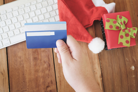 Shopping online pay by credit card. Christmas shopping.の写真素材