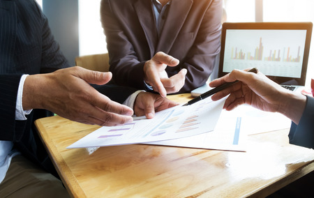 Young startups business meeting to discuss the situation on the marketing in the meeting room. Business teamwork meeting concept.の写真素材