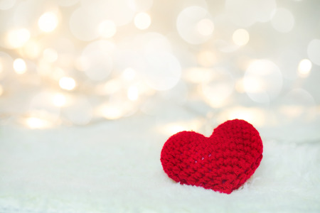 Red heart and Love Valentines day on white bokeh background.